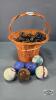 SMALL WICKER BASCKET WITH LARGE MARBLES