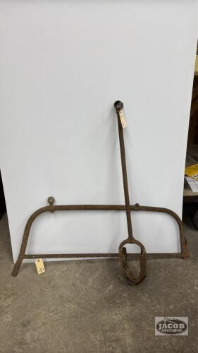 MANUAL POST HOLE AUGER WITH A RUSTY BOW SAW