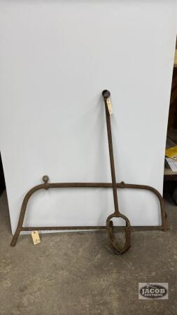 MANUAL POST HOLE AUGER WITH A RUSTY BOW SAW