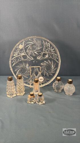 (3) SETS OF SALT AND PEPPERS ON A 10IN GLASS PLATE