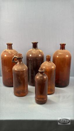 (6) AMBER BOTTLES