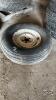 11L-15 TIRE AND 5-BOLT RIM
