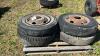 (4) 10 BOLT RIMS WITH 8.25R20 - 2