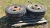 (4) 10 BOLT RIMS WITH 8.25R20 - 4