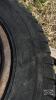 (4) 10 BOLT RIMS WITH 8.25R20 - 9