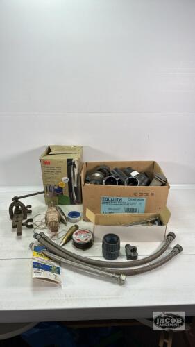 BOX OF N95 MASKS AND QUANTITY OF PLUMBING SUPPLIES
