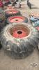 Pair of 14.9 24 tires on case 8 bolt wheels - 2