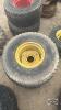 Pair of titan 44x18.00-20 tires on Jd 8 bolt wheels - 2
