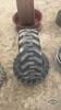 Pair of 12-16.5 tires on Jd 8 bolt wheels - 2