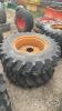 Pair of 13.6-24 Firestone tires on case 8 bolt wheels - 2