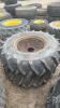 Pair of 14.9 24 tires on case 8 bolt wheels