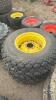 Pair of 16.9 24 tires on Jd 8 bolt wheels