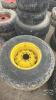 Pair of 16.9 24 tires on Jd 8 bolt wheels - 2