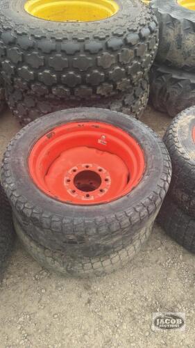Pair of 305-521 tires on 8 bolt Kubota wheels