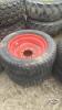 Pair of 305-521 tires on 8 bolt Kubota wheels
