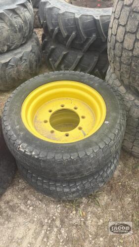 Pair of 305-521 tires on Jd 8 bolt wheels