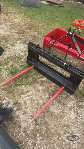 Unused skid steer quick tach 2 prong bale spear