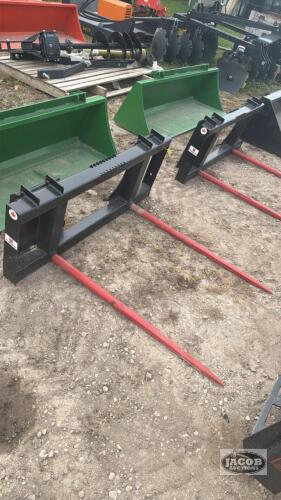 Unused skid steer quick tach 2 prong bale spear