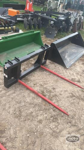Unused skid steer quick tach 2 prong bale spear