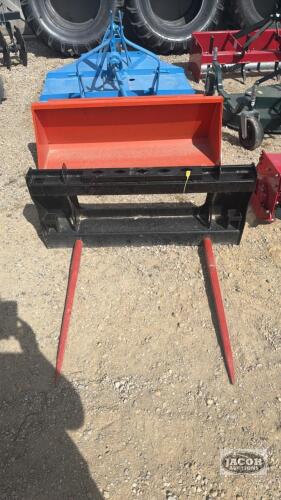 Unused skid steer quick tach 2 prong bale spear
