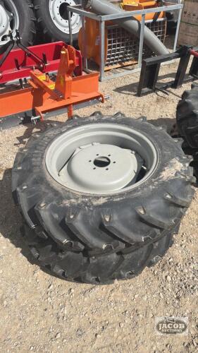 Unused ALliance 11.2 24 tire on 6 bolt wheel x2