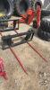 Unused skid steer quick tach 2 prong bale spear