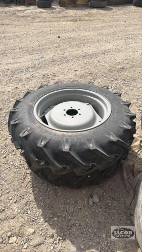 Unused 11.2 -24 tire on 6 bolt wheel x2