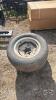 Pair of 27x10.50-15 tires on Newholland Tc 6 bolt wheels
