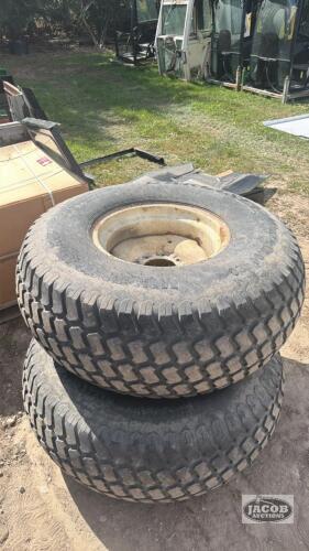 Pair of 44x18.00-20 tires on Newholland 8 bolt wheels