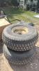 Pair of 44x18.00-20 tires on Newholland 8 bolt wheels