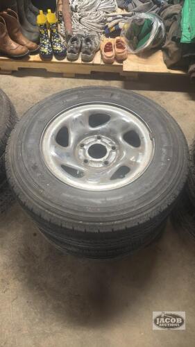 Pair of 225/75R16 tires of 5 bolt wheels