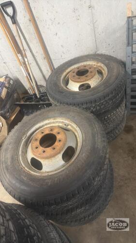 Set of 6 Lt225/75R16 tires on 8 bolt wheels