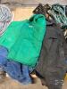 2 piles of men&rsquo;s clothing