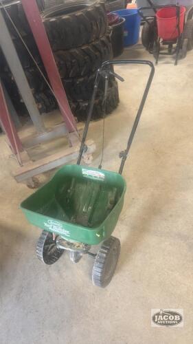 Walk behind grass seed spreader