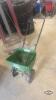 Walk behind grass seed spreader