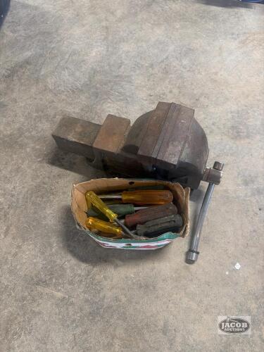 Bench vise and screw drivers