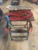 2 saw horses with exstenton cord