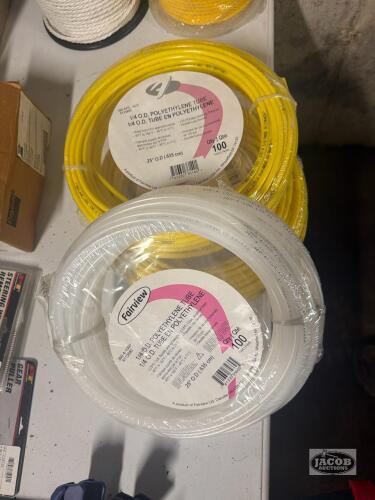Three rolls of plastic tube