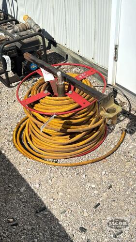 YELLOW PRESSURE HOSE ON REEL