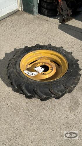 SPARE TIRE OFF A NH 166 HAY INVERTER ON 4 BOLT RIM