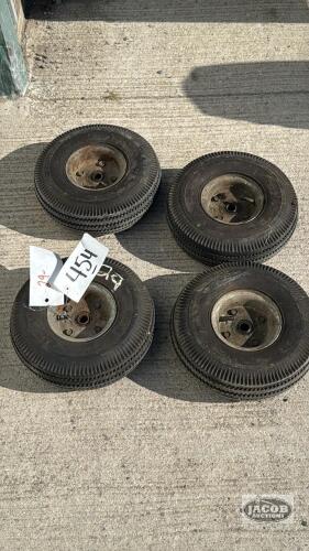 (4) SMALL PNUEMATIC TIRES ON RIMS
