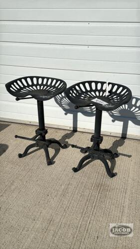 PAIR OF MATCHING CAST IRON TRACTOR SEAT STOOLS
