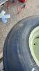 SET OF 4 UNUSED 11L15 TIRES AND RIMS - 4