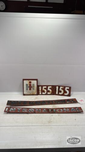 (5) TIN TRACTOR DECALS OFF INTERNATIONAL 155