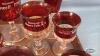 APPROX (21) RUBY GLASS SOUVENIOR LOT - 5
