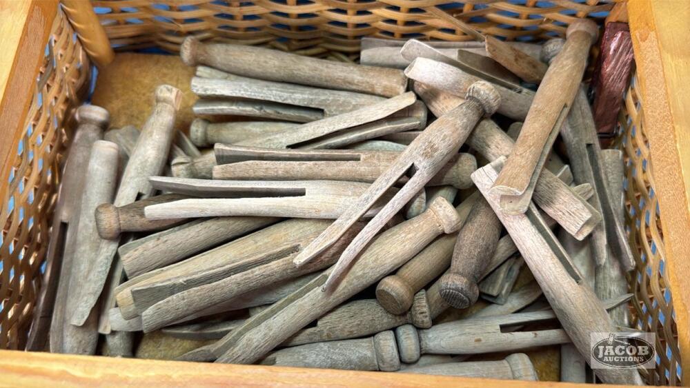 QUANTITY OF CLOTHES PIN IN WICKER BOX