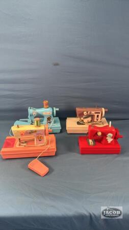 (4) PLASTIC CHILDRENS TOY SEWING MACHINES