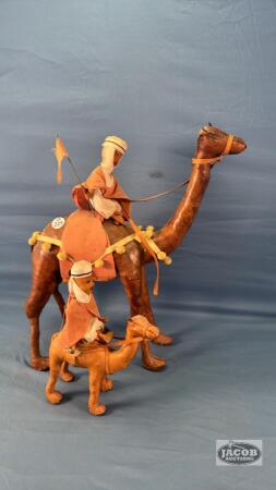 (2) LEATHER CAMEL AND RIDER FIGURES
