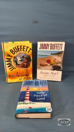 (3) JIMMY BUFFETT HARD COVER BOOKS