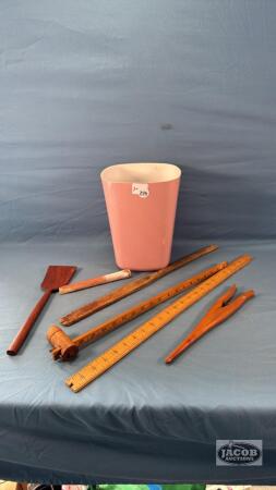 ASSORTED WOODEN UTENSILS IN GARBAGE CAN
